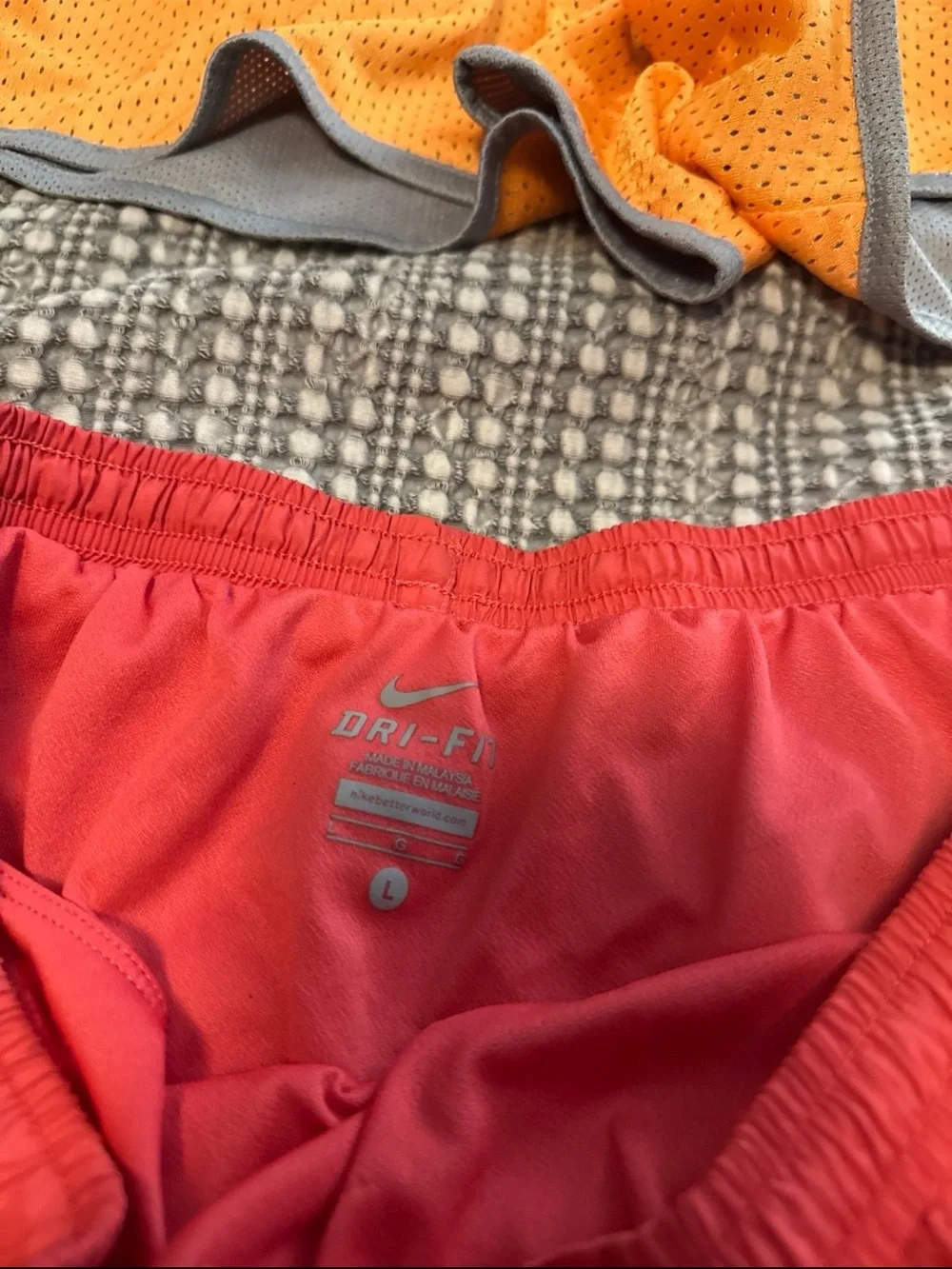 Nike women running shorts bundle of 4 in size Large